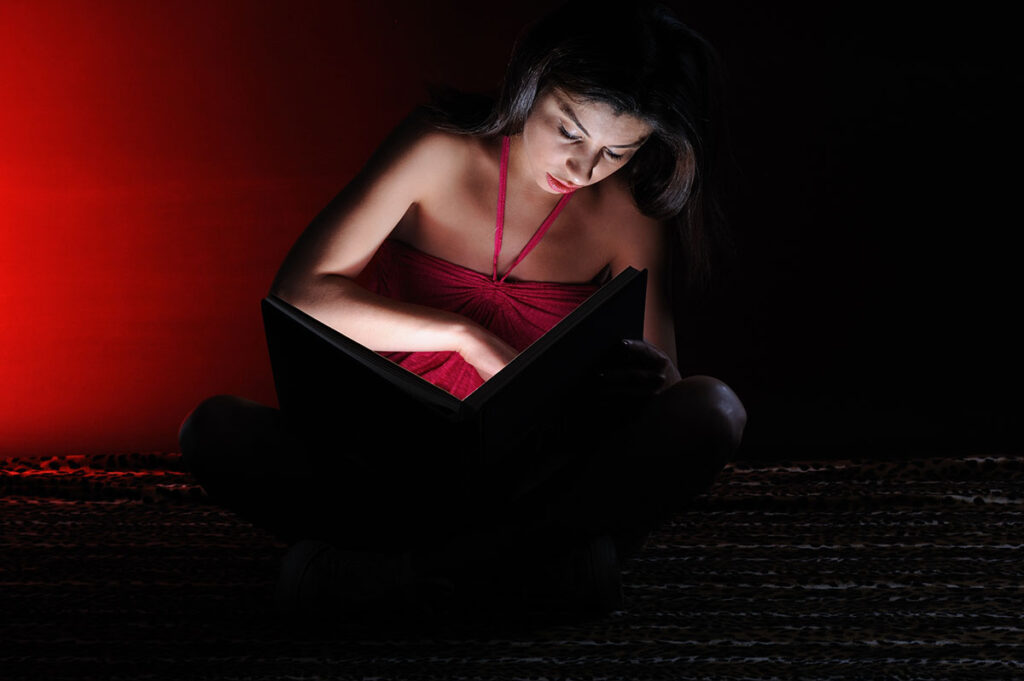Light of book - the girl seriously reading